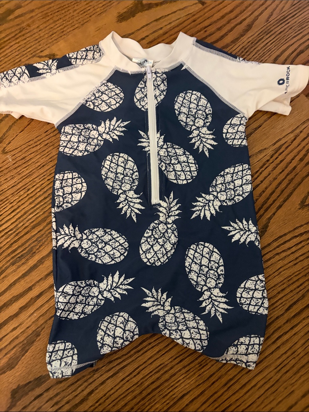 Snapper Rock Navy and White Pineapple Zip-Front One-Piece